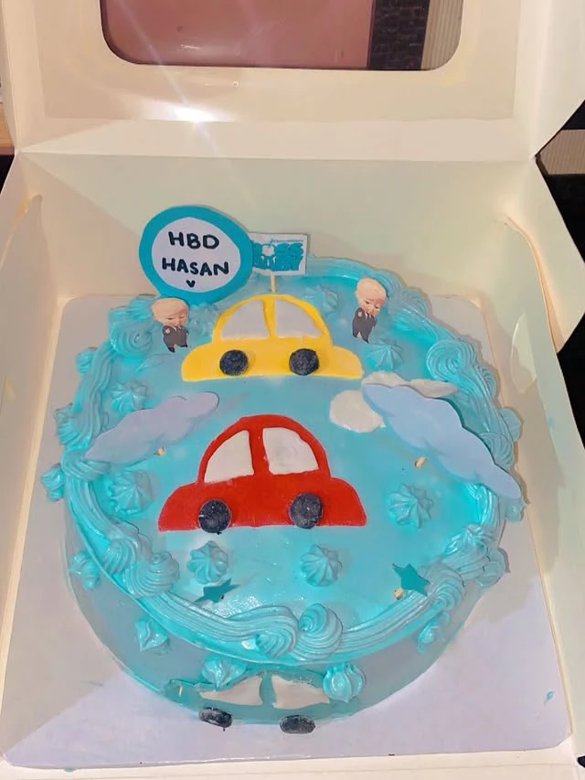 Birthday car theme cake for Hasan with vehicle decorations and custom design - Themed Birthday Cakes Karachi By Whisk And Sift
